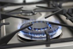 A close up with of a cooker using gas
